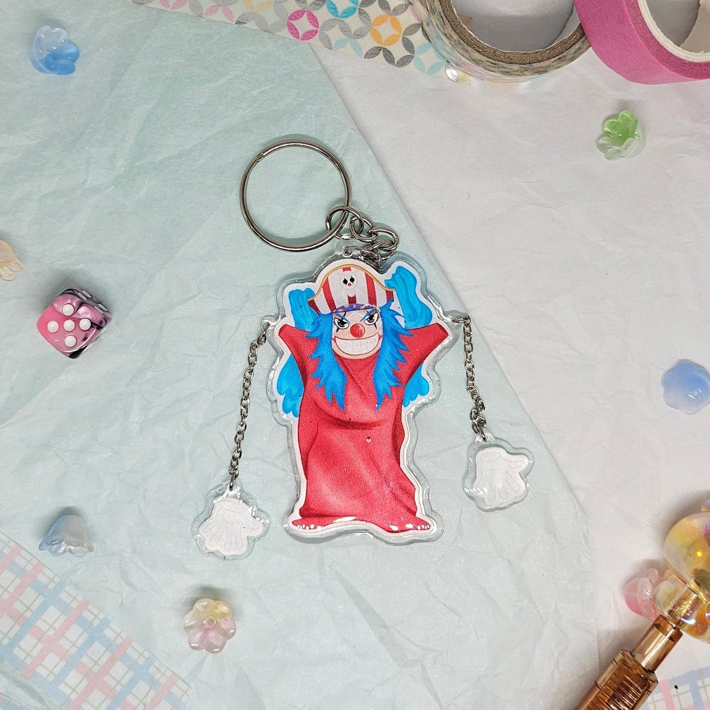 Buggy the Clown from One Piece, his hands are on separate chains and detatched