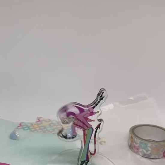Video of Helluva Boss Fizzarolli Spinning Acrylic Standee